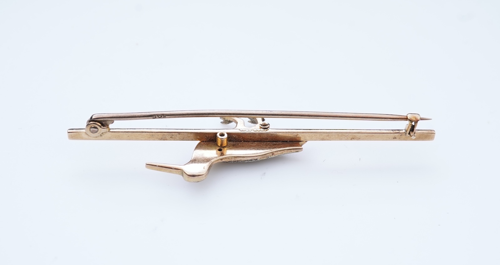 A gold and enamel brooch, circa 1900